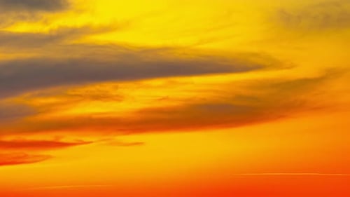 Golden Sunset Sky with Clouds