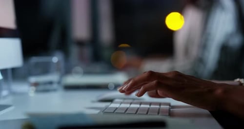 Hands, night or journalist typing on computer in workplace working on research or project online