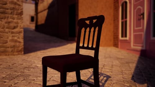 A Wooden Chair Sitting on a Cobblestone Street