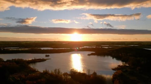 Aerial view of autumn sunset over lake