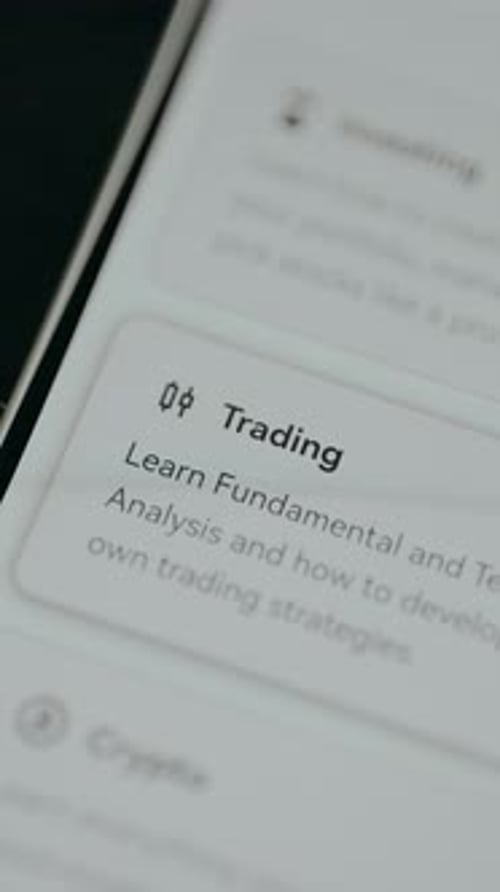 Interactive Text Urging Users to Learn More About Trading