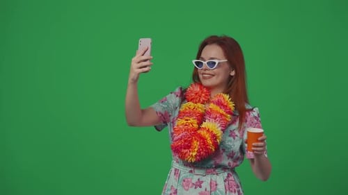 Woman Taking Selfie with Phone on Green Screen