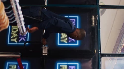 Vertical Video Shoppers Push Red Tape Entering Store