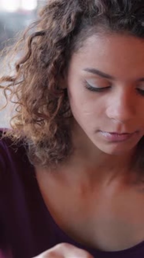 Woman Enjoys Coffee at Home in the Daytime