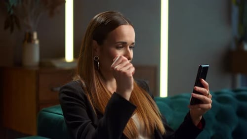 Woman Video Calling with Smartphone in Living Room