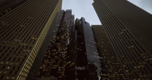 Upward View of Modern City Skyscrapers at Dusk