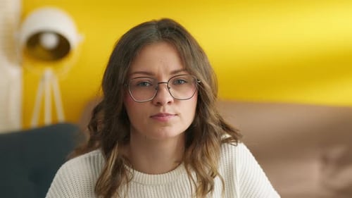 Smart Girl Posing on Camera in Room University Student Wearing Eyeglasses