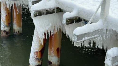 Frozen pier with icicles
