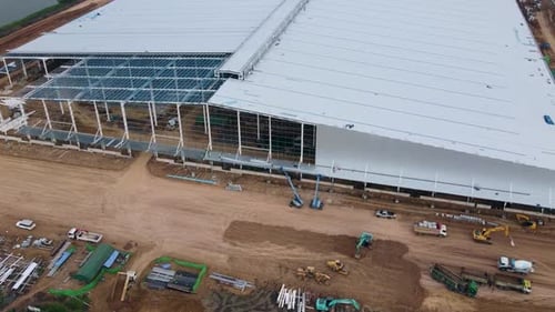 aerial view working in large warehouse construction site hyper lapse