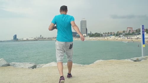 Man Admire City View After Jogging