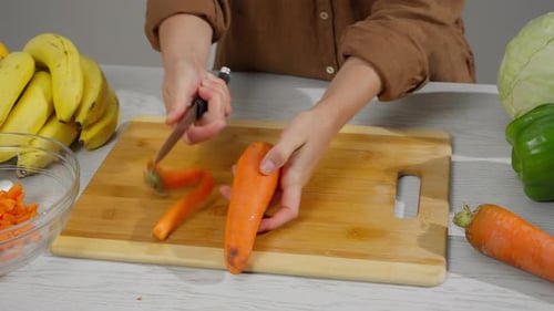 Chopping carrots and prepping fresh veggies
