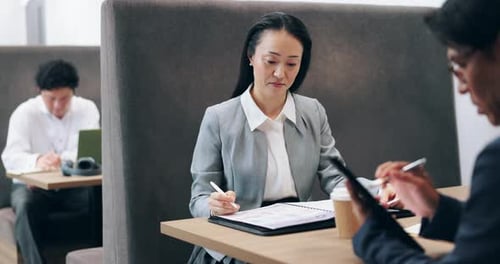 Japanese, business and people with documents in office for finance report