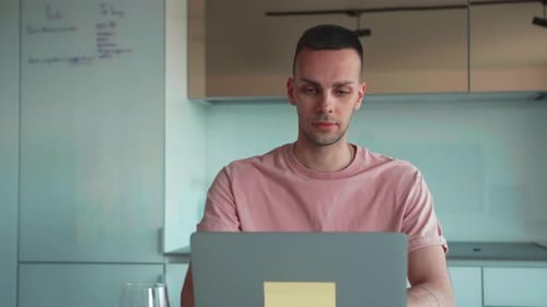 Handsome Caucasian Businessman Working on Laptop Computer at Home Office Male Professional Typing on