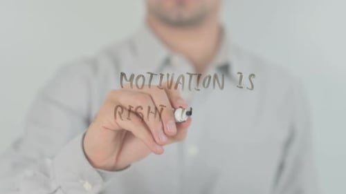 Person Writes Motivation Is Right Inside You