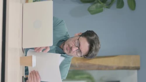 Adult Man Working From Home With Laptop