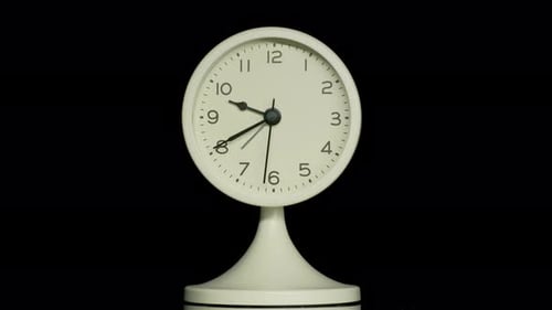 Clock Hands Spinning Quickly to Show Time Passing