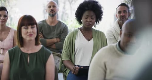 4k video footage of a group of businesspeople attending a conference in a modern office