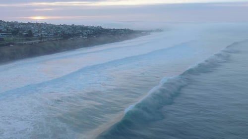 Morning sunrise with big waves.