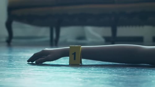 Crime Scene Investigation: Arm on Floor with Markers