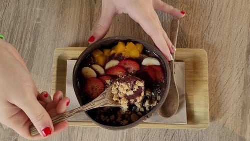 Overhead View of Fruit Bowl on Wood Table