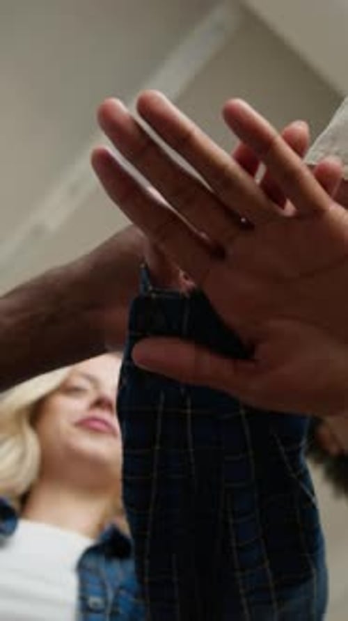 Close Up Stack Hands Four Students Multiracial Friends Team Group of Multiethnic People Stacking