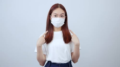 Asian women should wear white shirts, jeans, and everyone should wear masks when going out in crowde