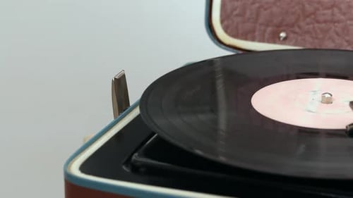 Spinning Vinyl Record on Vintage Turntable Close-up