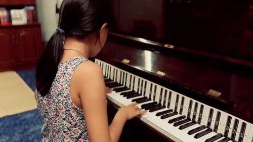 Girl Plays Piano at Home, Musical Instrument