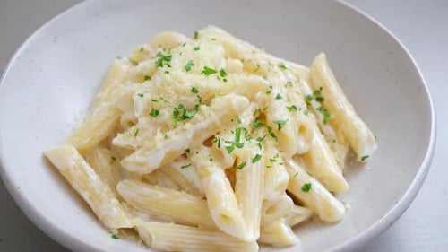 Creamy Penne Pasta with Cheese and Parsley