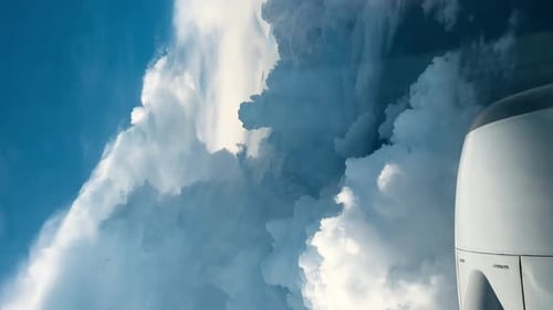 Clouds and Sky Seen from Airplane Window