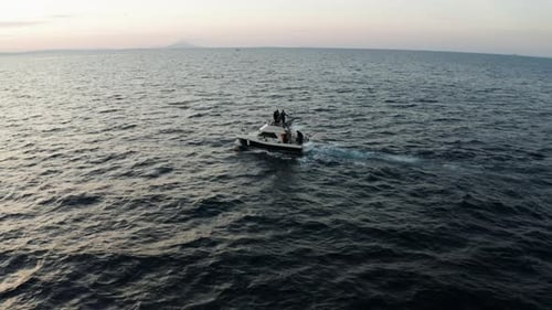 Fishermen On Motorboat Sailing Around Adriatic Sea Fishing For Tuna During Early Morning In Croatia.