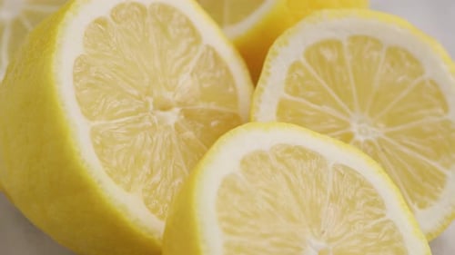 Close up fresh cut yellow lemons