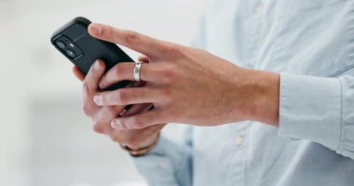 Hands Using Smartphone Device at Home