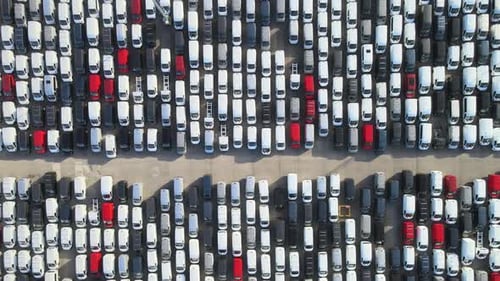 Aerial View of a Lot Full of Vans