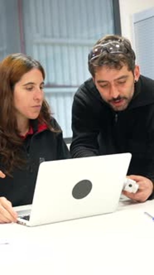 Engineers of a Industry Working with Laptop in the Office