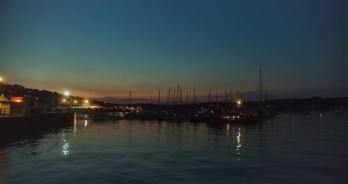 Boats Moored In The Falmouth Harbour At Night In Cornwall, England, United Kingdom. - wide