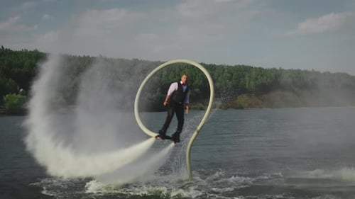 An Office Clerk Flies a Flyboard After a Day's Work
