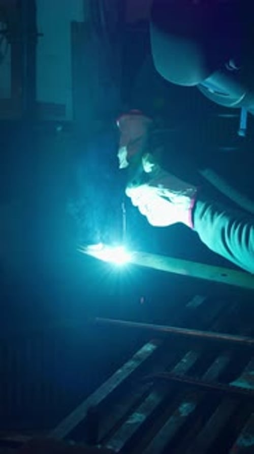 Welder Performs Arc Welding of Metal Structures Concept of Welding of Metal Structures