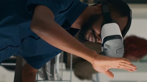 Vertical Video Database Admin Working with Virtual Reality Glasses to Develop Server App