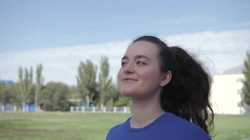 Young Athlete Woman Running the stadium, Training Hard, Getting Ready for Race Competition
