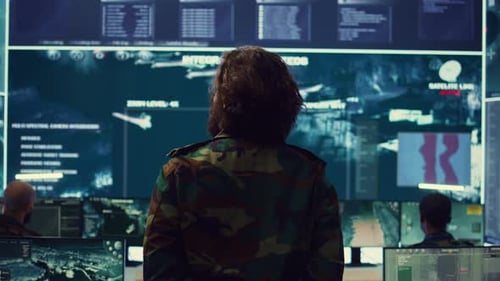 Adults Working in Futuristic High-Tech Control Room