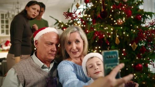 Family Celebrates Christmas and Takes a Selfie