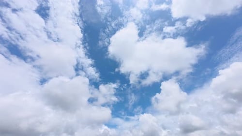 Clouds Drifting Across Blue Sky, Aerial View