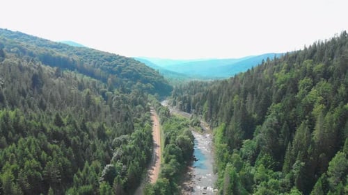 Aerial Video Shooting in Nature Among Mountains Rivers and Green Forests
