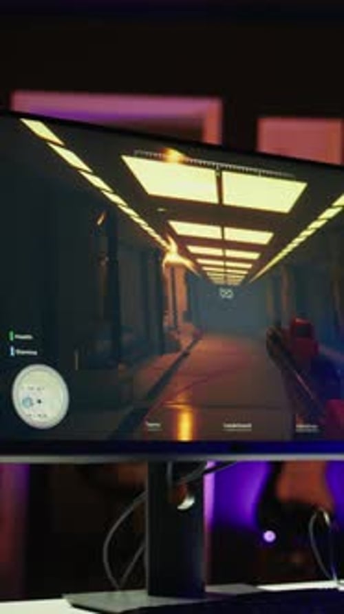 Vertical Video FPS Videogame Left Open on Pc Display and Computer Peripherals in Apartment