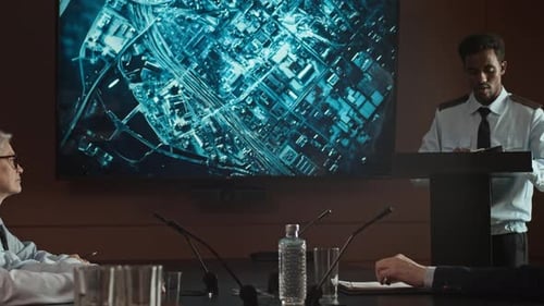 Corporate Meeting with Aerial Cityscape on Screen