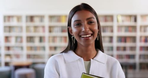 Books, research and library with face of woman on campus for education, studying or learning