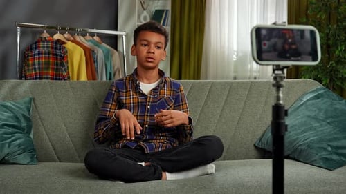 Teen Boy Vlogging at Home on Smartphone