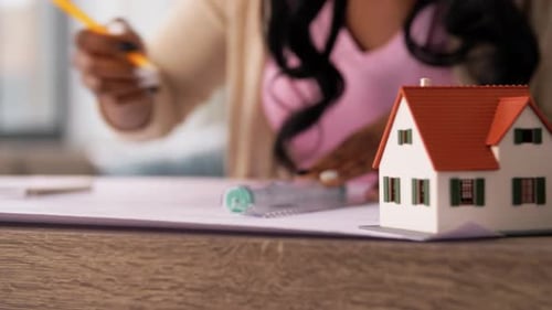 Architecture, Building, Construction And Real Estate Concept - Closeup Shot Of African American F...