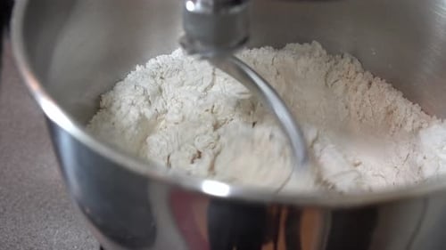 the machine kneads dough on the production of bakery products. baking and industrial food production